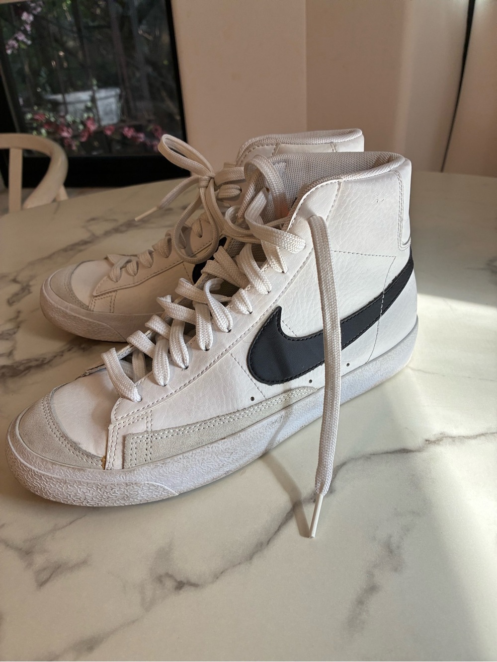 Nike White High-Top Sneakers with Black Swoosh Accent